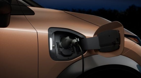 Close-up image of charging cable plugged in | Passport Nissan Alexandria in Alexandria VA